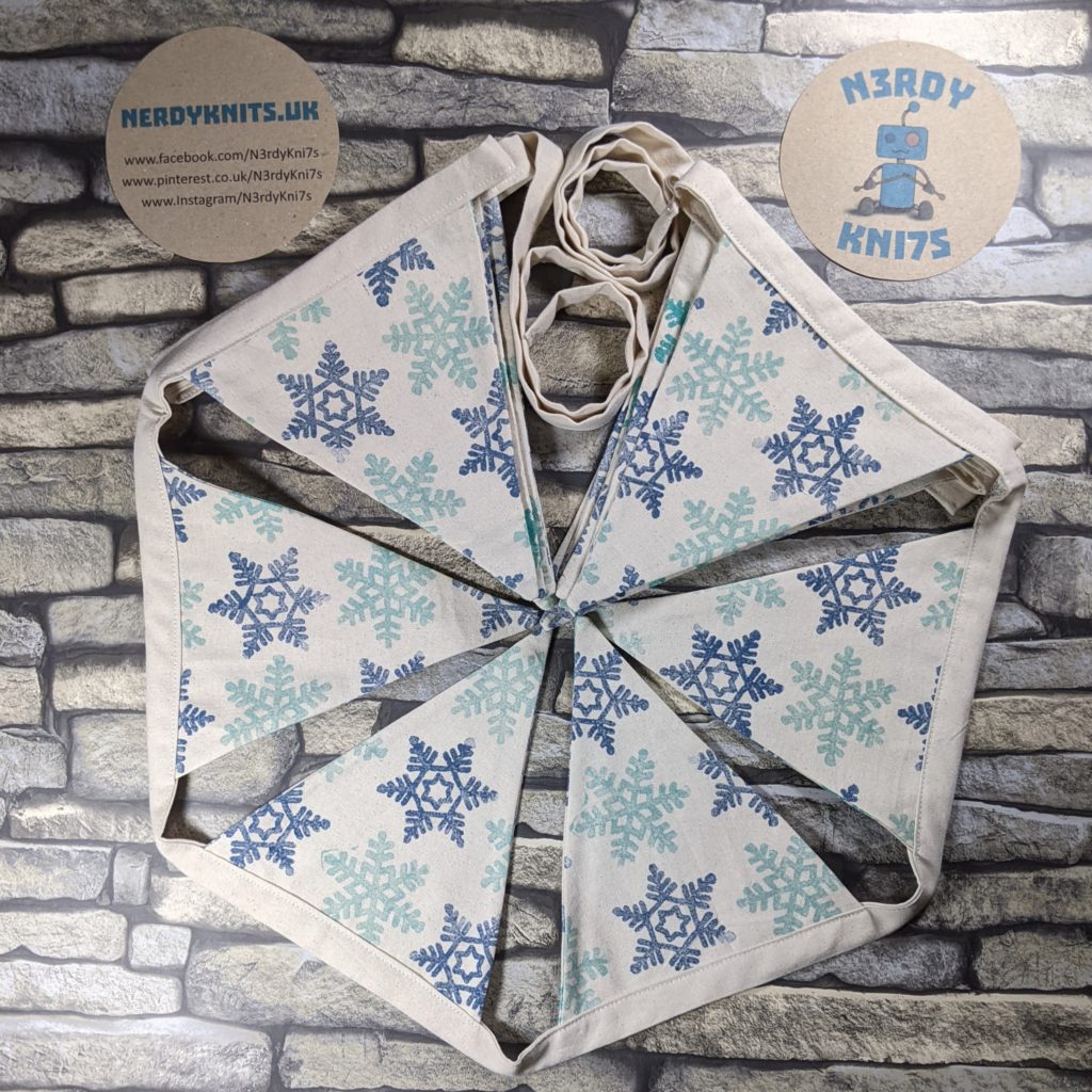 Snowflake bunting in midnight blue and aquamarine